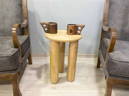 Handcrafted solid chestnut wood coffee table with round top and tapered wood legs